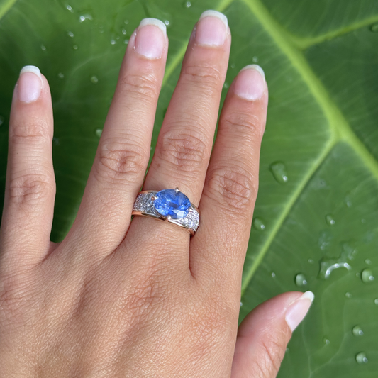 oval sapphire diamond ring worn on hand bespoke design