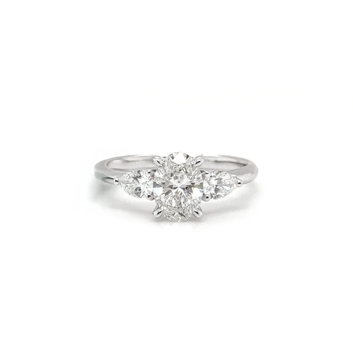 trilogy engagement ring yellow gold diamond
