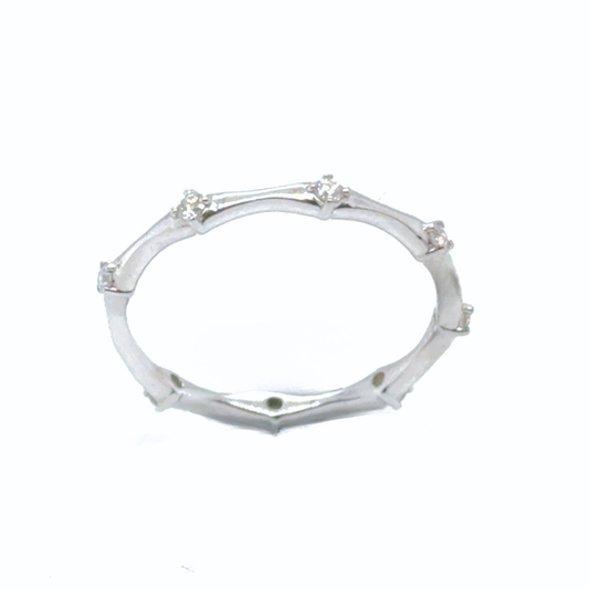 Giselle diamond band in 18kt white gold with 0.13ct round brilliant diamond, sculptural organic design