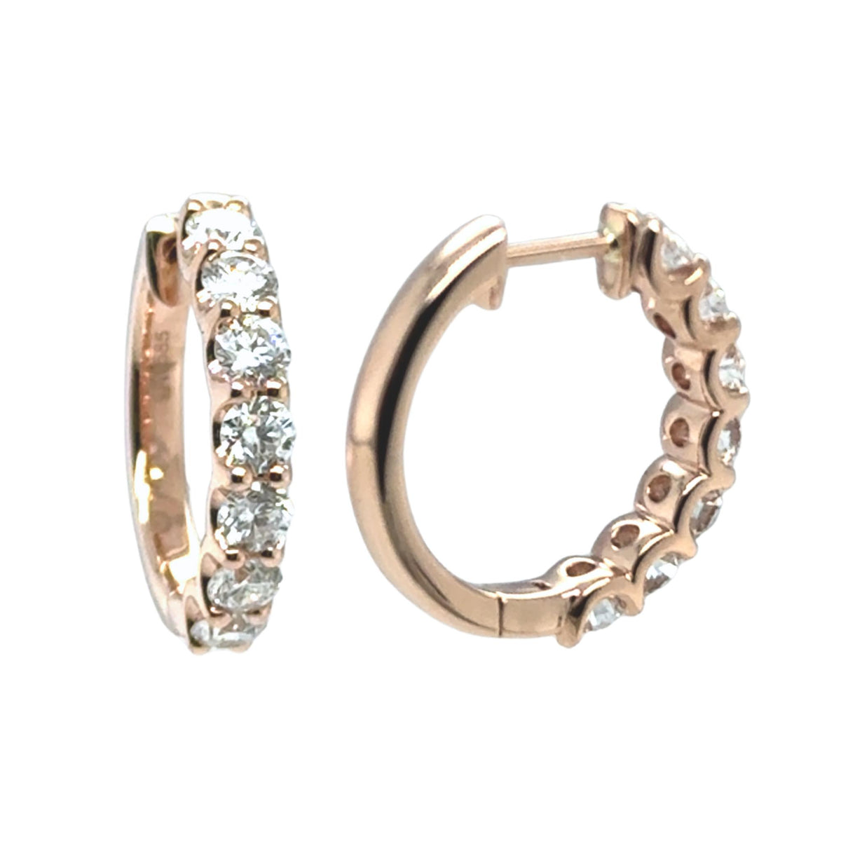 14kt rose gold diamond huggie earrings with round brilliant lab grown diamonds.