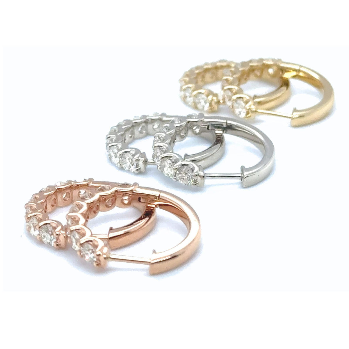 Diamond huggie earrings in mixed 14kt gold tones