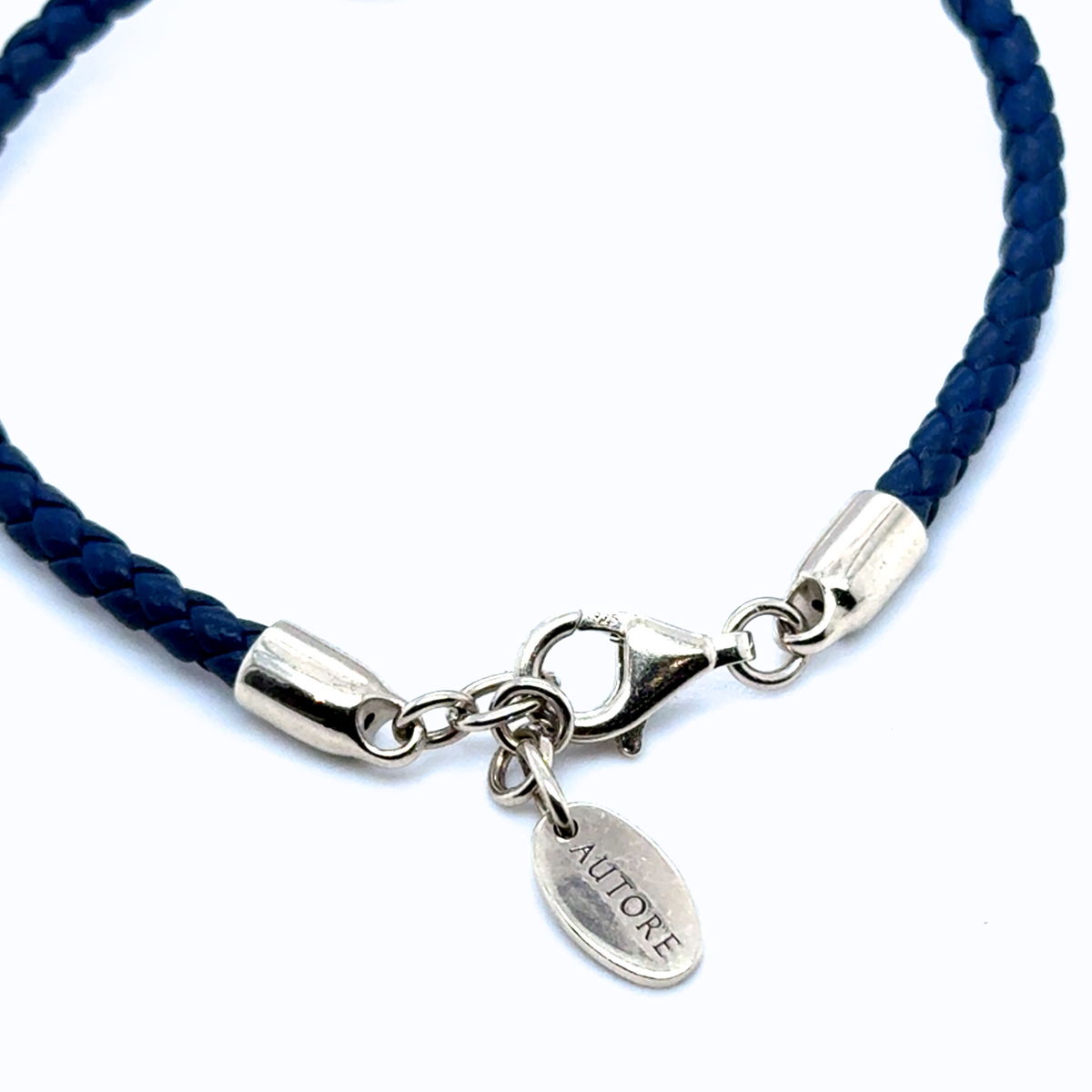 Naya deep-blue leather bracelet with Autore South Sea Pearl and signature clasp detail.