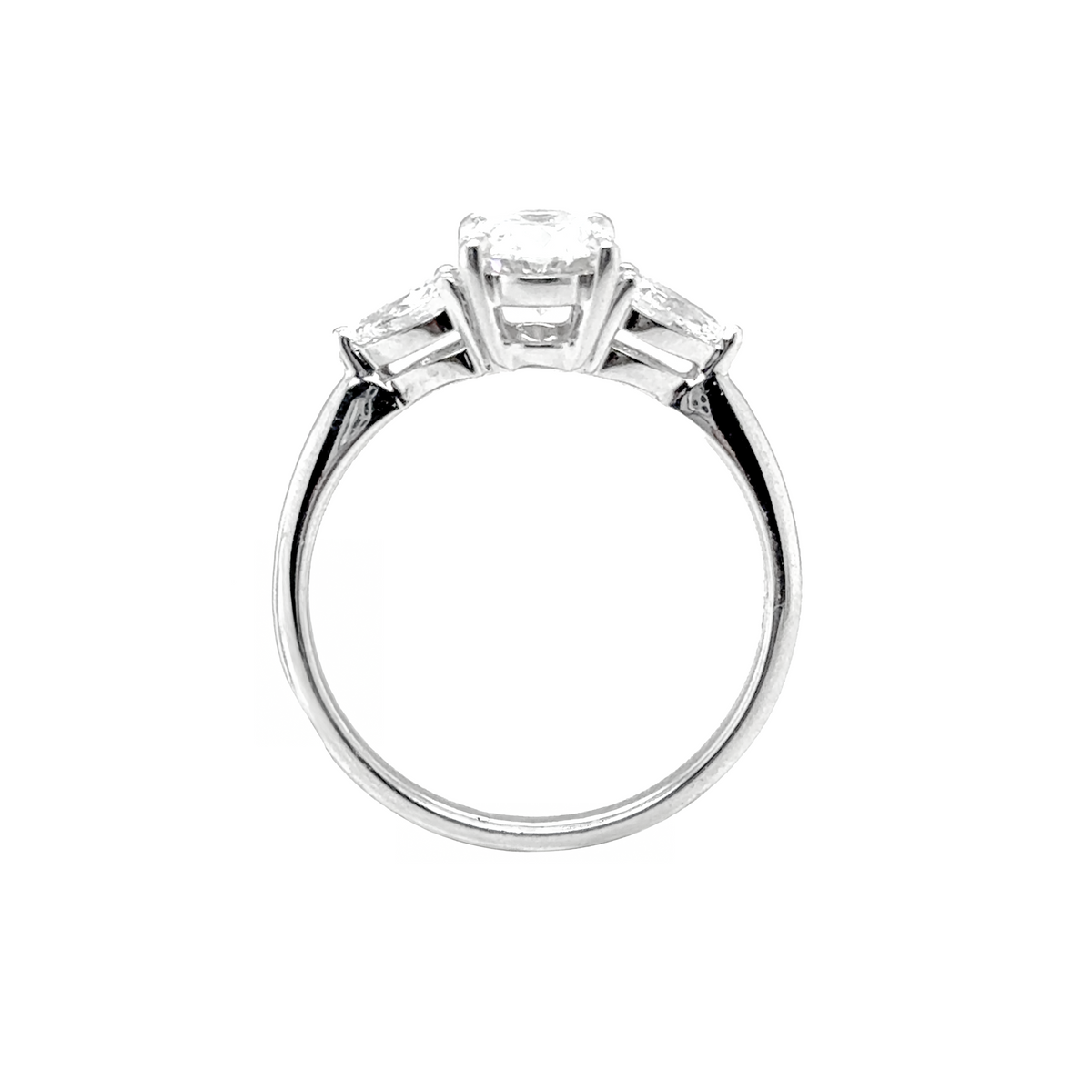 oval diamond ring with pear side stones