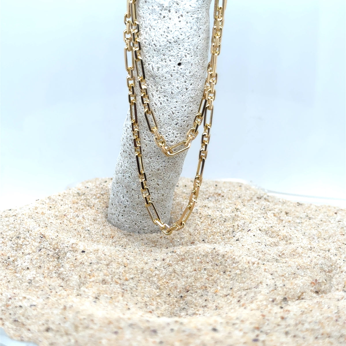 Gold Figaro chain suitable for layering or wearing alone