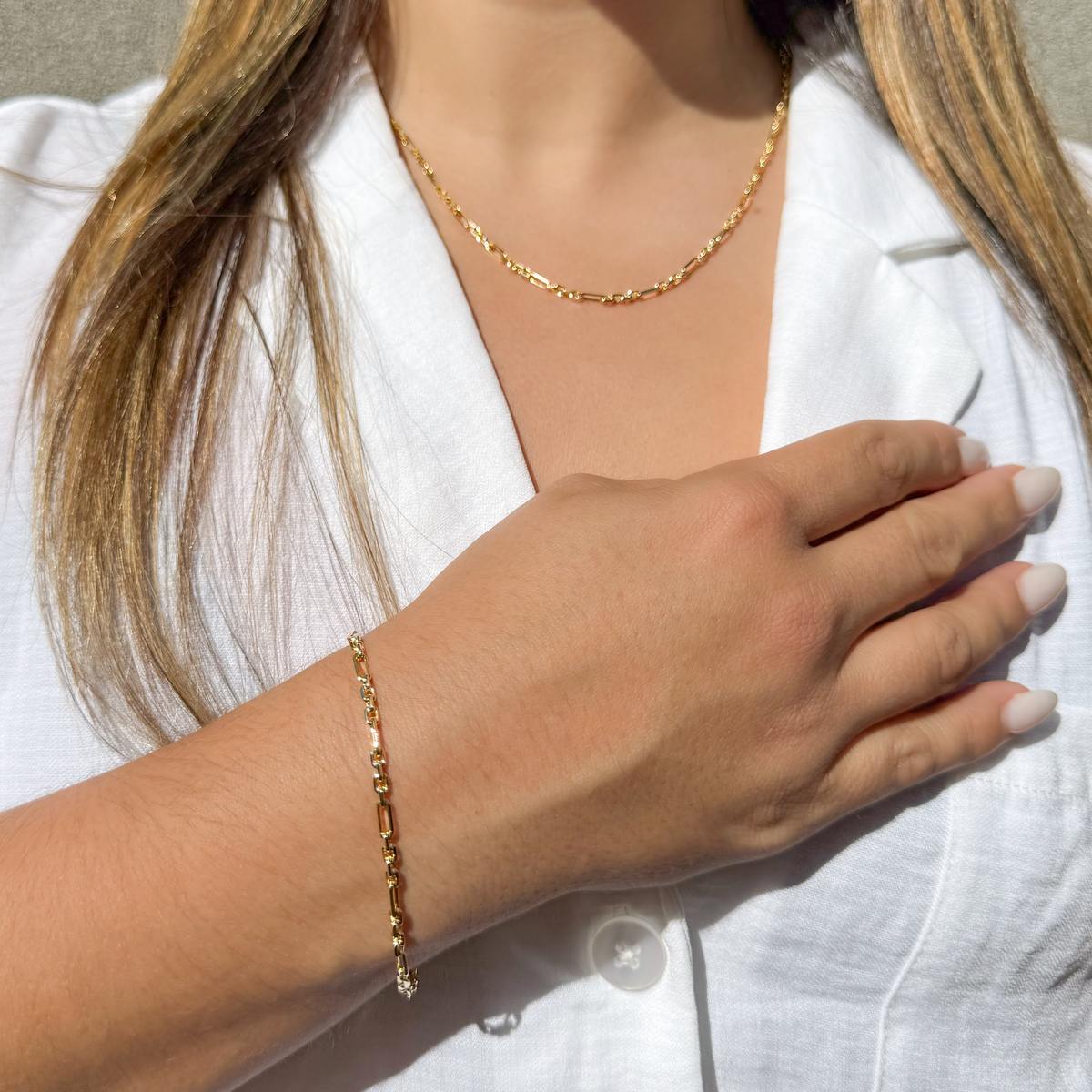 solid yellow gold Trace link figaro necklace and bracelet