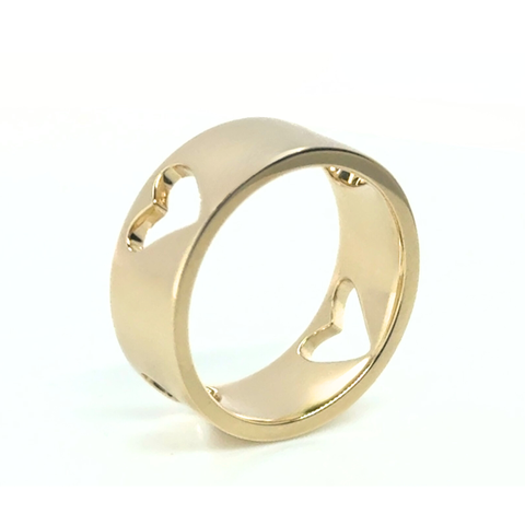 Matt & Chloe custom-made gold heart ring worn on hand, personalised symbolic jewellery