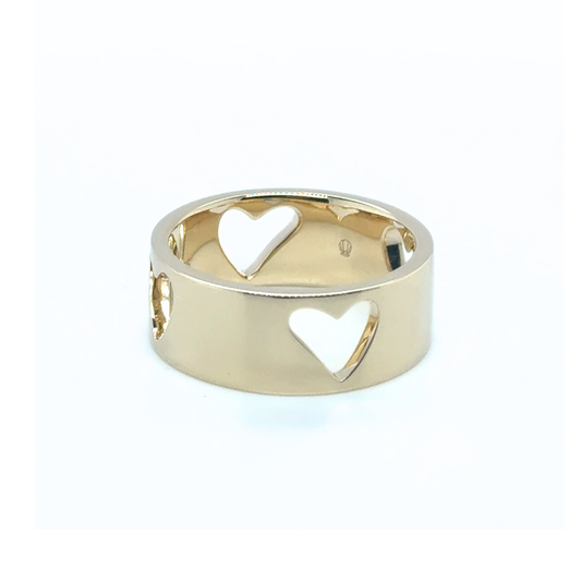 Custom-made gold wedding ring with four heart cut-outs inspired by Matt & Chloe’s tattoo design.