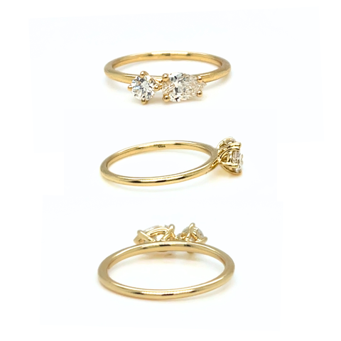 Custom-made Toi et Moi diamond ring shown from multiple angles in 18kt yellow gold.