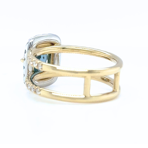 Side view of Santa Maria aquamarine ring with diamond pavé shoulders in yellow gold.