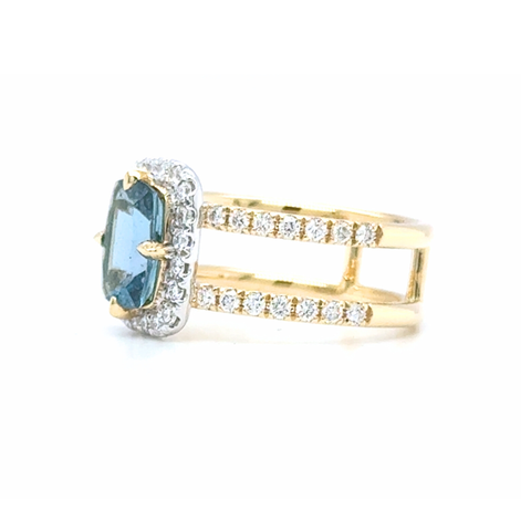 Side view of Santa Maria aquamarine ring with diamond pavé shoulders in yellow gold.