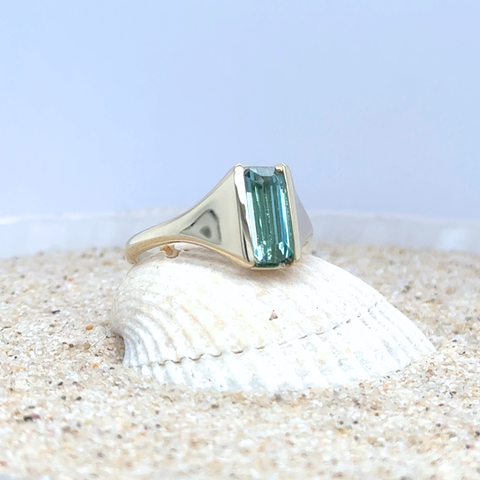 Emerald cut blue tourmaline gemstone ring