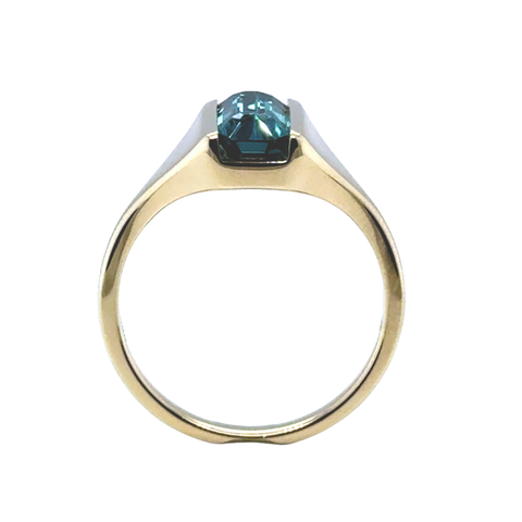Minimalist blue tourmaline ring on hand