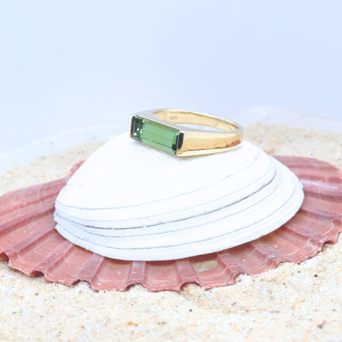 Yellow gold tourmaline ring with clean architectural setting
