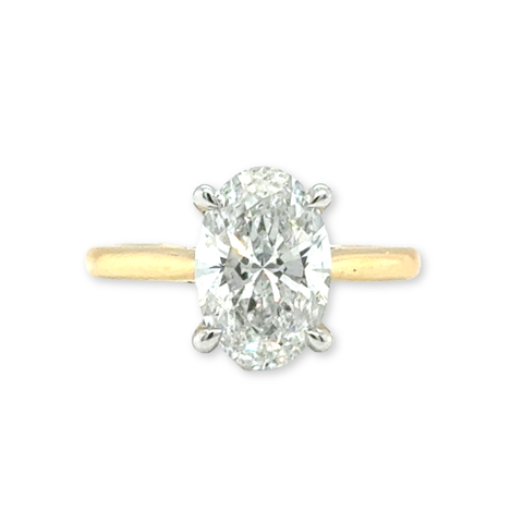 3ct oval lab-grown diamond solitaire ring in yellow gold and platinum