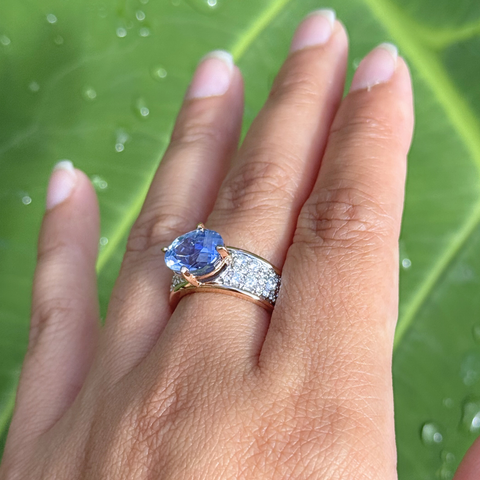 oval sapphire diamond ring worn on hand bespoke design