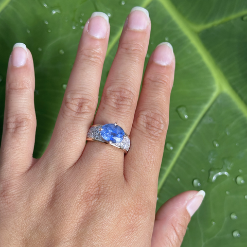 oval sapphire diamond ring worn on hand bespoke design