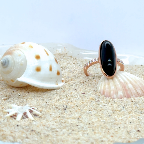 black onyx statement ring with diamonds on band