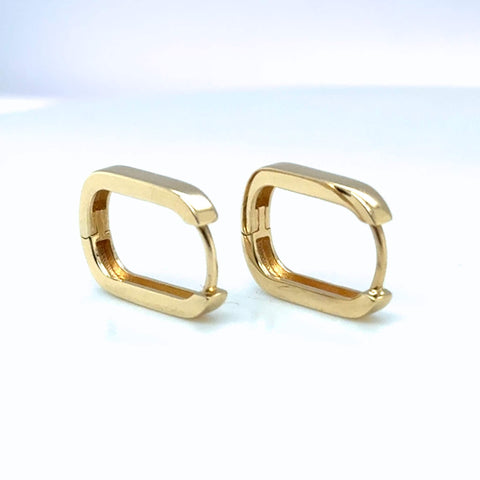 Classic 15mm gold hoop earrings styled 