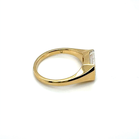bezel set emerald cut diamond ring side view