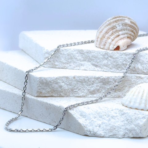 Platinum trace chain styled on neckline