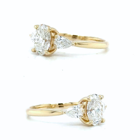 trilogy engagement ring yellow gold diamond
