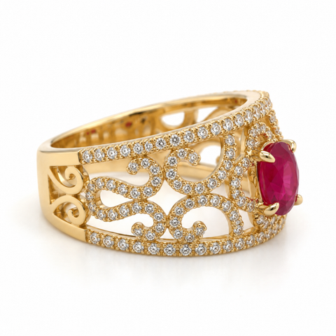 Side view of Aisha ruby ring showing openwork gold filigree and diamond setting