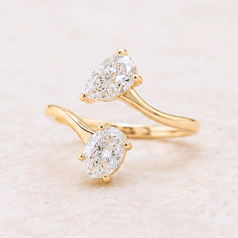 Contemporary dual stone diamond ring in yellow gold