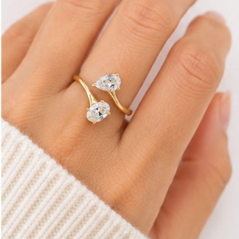 Modern Toi et Moi engagement ring on hand