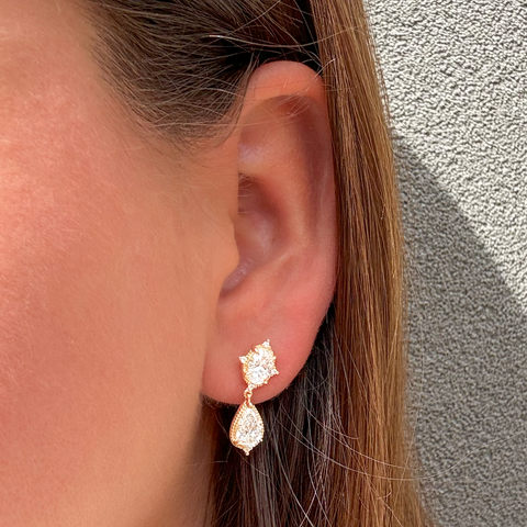 Statement diamond drop earrings worn on ear bridal collection