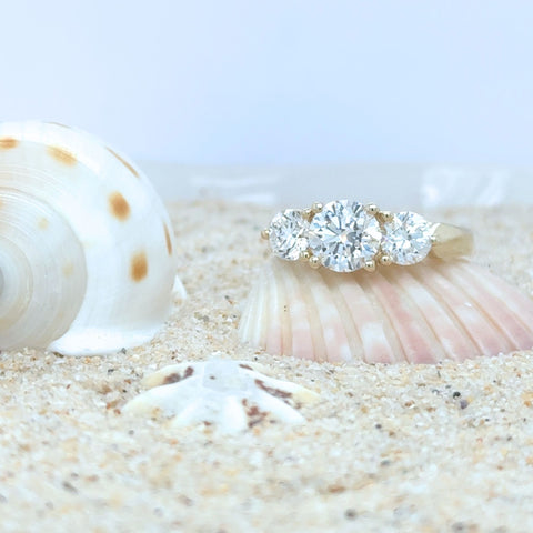 three stone diamond engagement ring gold