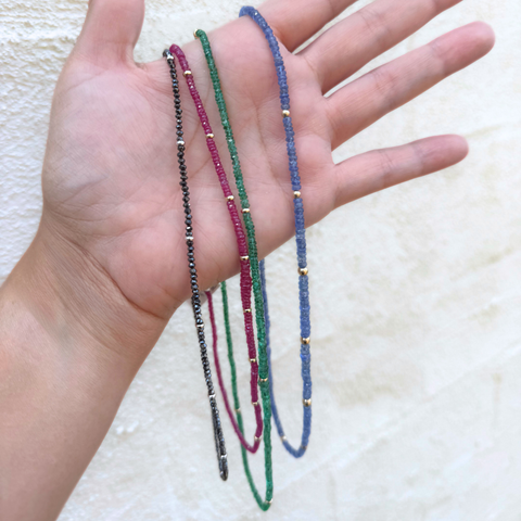 Gemstone strand collection including black diamonds, Mozambique ruby, Burmese ruby and sapphire