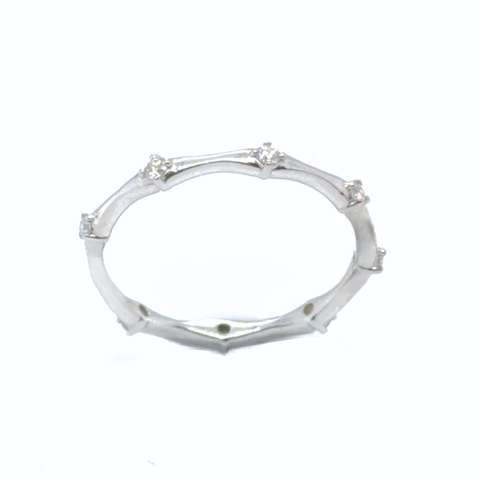 Giselle diamond band in 18kt white gold with 0.13ct round brilliant diamond, sculptural organic design