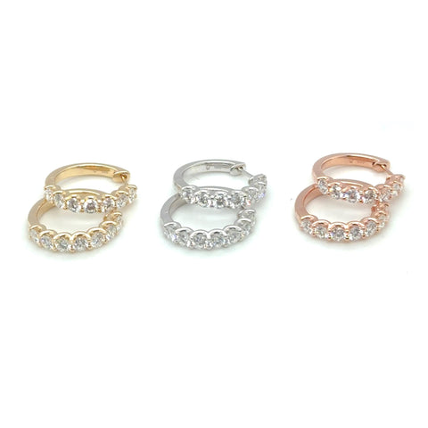 Stacked diamond huggie earrings in 14kt gold featuring round brilliant lab grown diamonds.