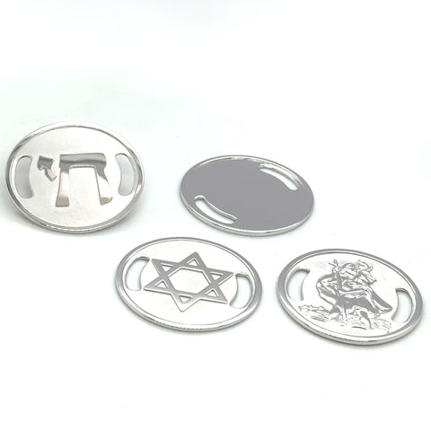 Four silver medallions with different designs on a white background
