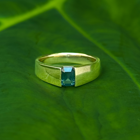 Lucien fantasy inspired ring featuring emerald cut Australian parti colour sapphire in 14kt yellow gold