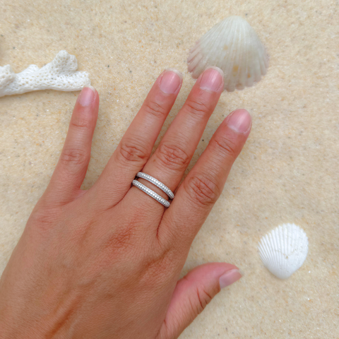 McKenzie diamond band worn on hand, 18kt gold round brilliant diamond ring