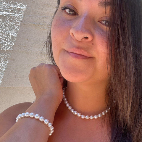 White South Sea pearls laid flat on natural surface