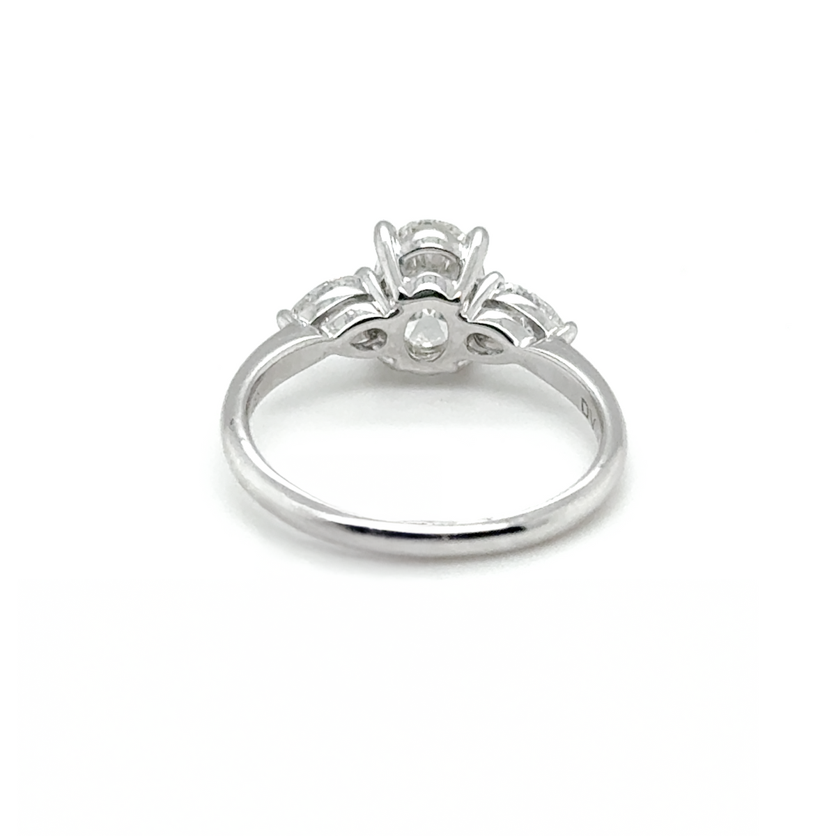 oval and pear trilogy diamond engagement ring