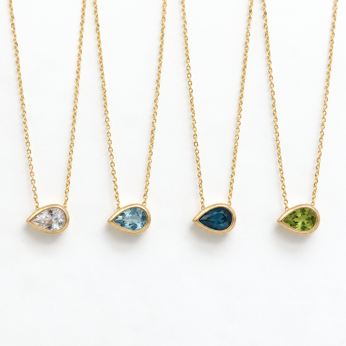 Pear Aroha gemstone slider necklaces in 14kt yellow gold