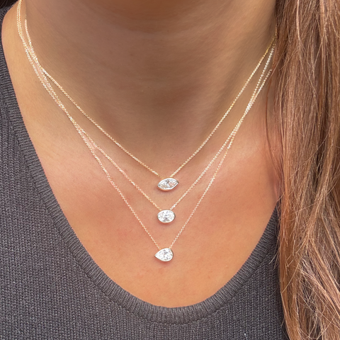 Pear Aroha layered gemstone necklaces worn at different lengths