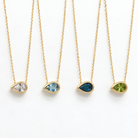 Pear Aroha gemstone slider necklaces in 14kt yellow gold