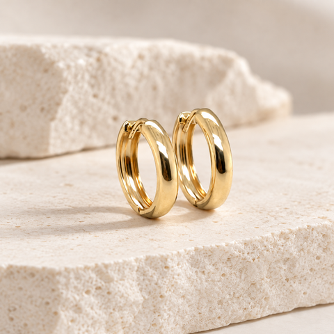 Italian-made 10mm yellow gold huggie earrings