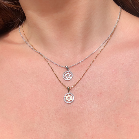 Diamond Star of David pendant worn on necklace