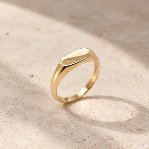 9kt yellow gold elongated East-West signet ring