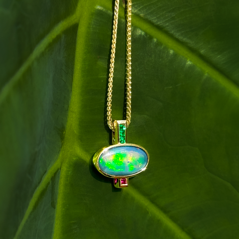 Lightning Ridge opal pendant with emerald and ruby accents