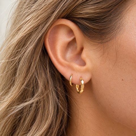 10mm gold sleeper earring worn on ear